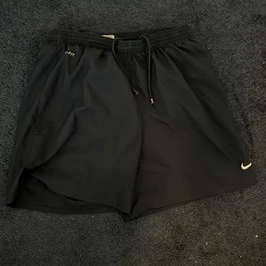 Dark blue Nike shorts medium, with netting inside